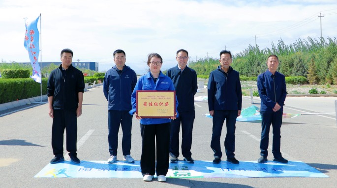 新能源公司組織職工參加武威涼州工業(yè)園區(qū)“匠心向黨 步履不?！甭毠そ〔阶呋顒?dòng)